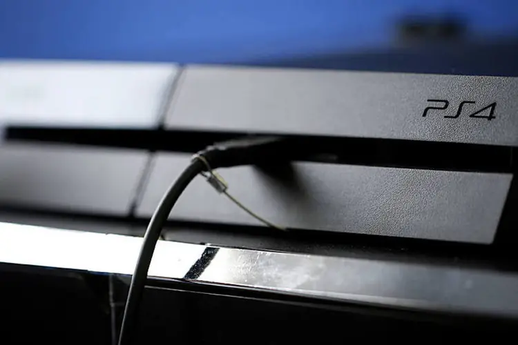 
	Playstation 4: segundo a rede CNN, a rede do PlayStation continua fora do ar
 (Kiyoshi Ota/Bloomberg)