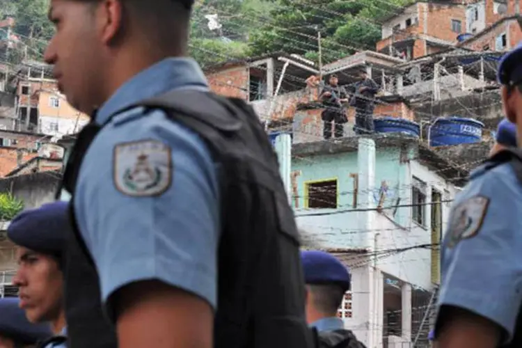 
	PM do Rio: de acordo com a PM, o batalh&atilde;o est&aacute; em atividade h&aacute; tr&ecirc;s meses, com cerca de 500 policiais, e a publica&ccedil;&atilde;o de hoje foi para tornar oficial as opera&ccedil;&otilde;es do grupo (Marcello Casal Jr./ABr)