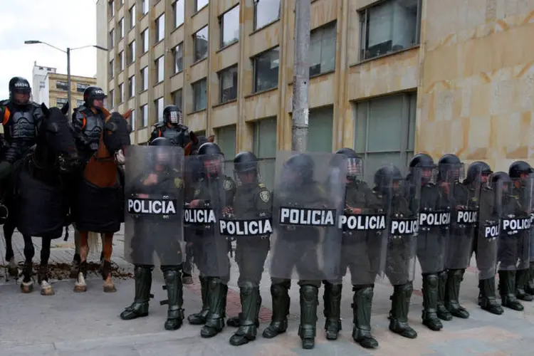 
	Pol&iacute;cia: a nova estrat&eacute;gia se aplicar&aacute; a partir desta quinta-feira contra o Cl&atilde; &Uacute;suga, Los Pelusos e Los Puntilleros, os tr&ecirc;s principais grupos criminosos do pa&iacute;s
 (John Vizcaino / Reuters)