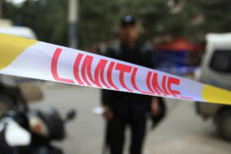
	Pol&iacute;cia isola &aacute;rea de crime: o ataque aconteceu por volta das 4h locais
 (AFP)
