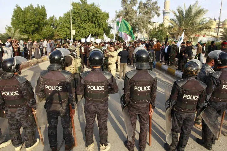 
	Opera&ccedil;&atilde;o: os supostos guerrilheiros abriram fogo e quatro agentes ficaram feridos
 (Alaa Al-Marjani / Reuters)