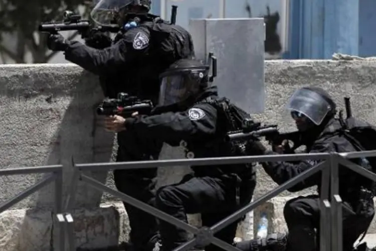Policiais em Jerusalém: 20 palestinos foram mortos hoje (Ahmad Gharabli/AFP)