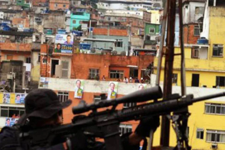 
	Rocinha: Amarildo est&aacute; desaparecido desde a noite de 14 de julho, quando foi conduzido por policiais militares de sua casa at&eacute; &agrave; sede da UPP da Favela da Rocinha, zona sul do Rio
 (©AFP / Antonio Scorza)