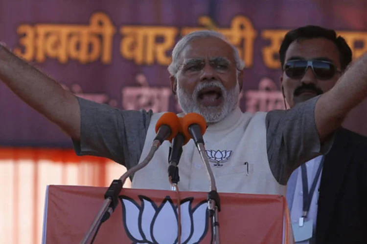 
	Nacionalista hindu Narendra Modi, candidato ao cargo de primeiro-ministro pelo principal partido de oposi&ccedil;&atilde;o, Bharatiya Janata, faz com&iacute;cio em Gurgaon, nos arredores de Nova D&eacute;lhi, na &Iacute;ndia
 (Adnan Abidi/Reuters)