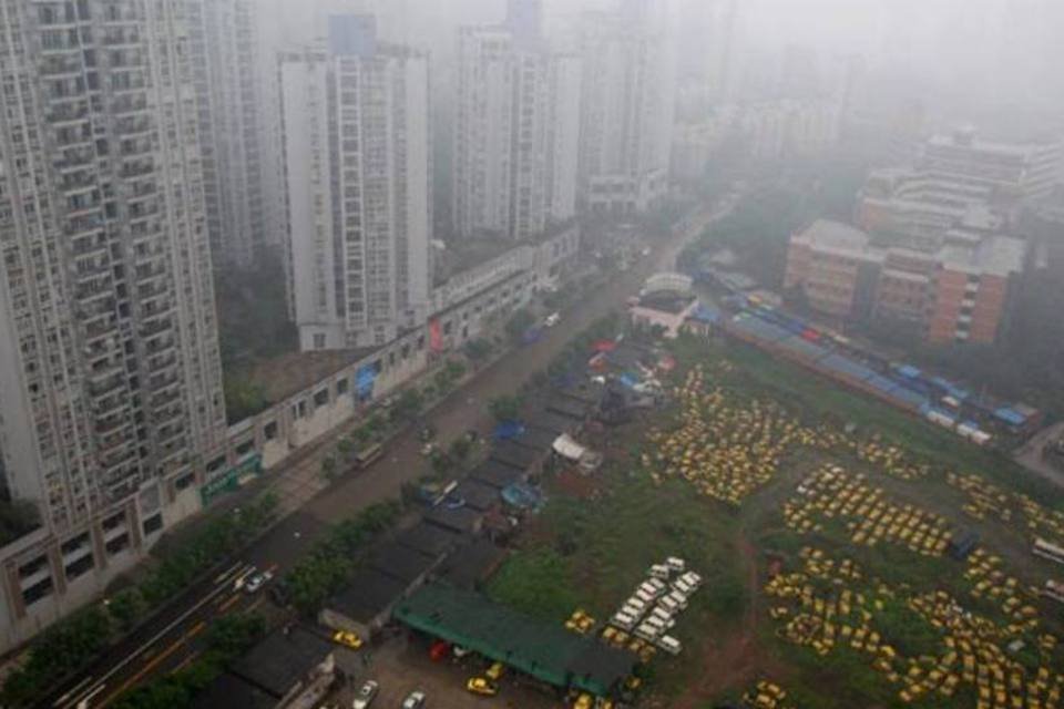Contra a poluição, China proíbe queima de roupas de mortos