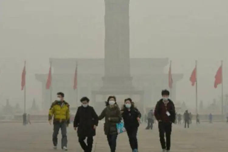 Poluição na Praça da Paz Celestial, em Pequim, China: "a Terra está em apuros", resume o Fundo Mundial para a Natureza, a WWF (Mark Ralston/AFP)