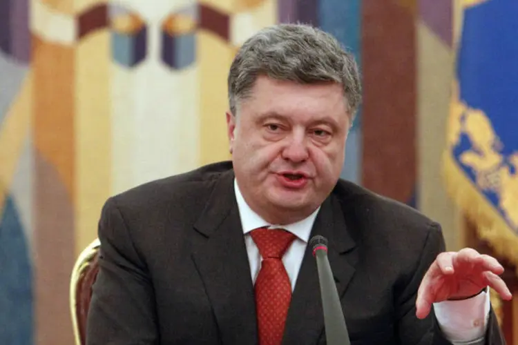 
	Poroshenko, presidente da Ucr&acirc;nia: para ele, a Ucr&acirc;nia n&atilde;o est&aacute; preparada para ingressar na Otan, mas lembrou que as portas do bloco ocidental &quot;est&atilde;o abertas para a Ucr&acirc;nia desde 2008&quot;
 (Valentyn Ogirenko/Reuters)