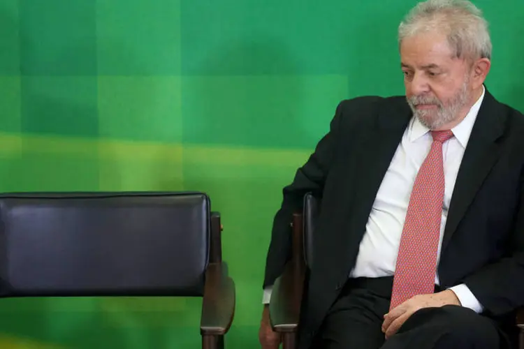Luiz Inacio Lula da Silva em cerimônia de posse como ministro da Casa Civil: pela primeira vez, ele senta no banco dos réus (Adriano Machado / Reuters)