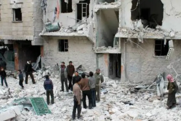 
	Destrui&ccedil;&atilde;o em Alepo, na S&iacute;ria: EIIL &eacute; um grupo jihadista que opera na S&iacute;ria
 (Baraa Al-Halabi/AFP)