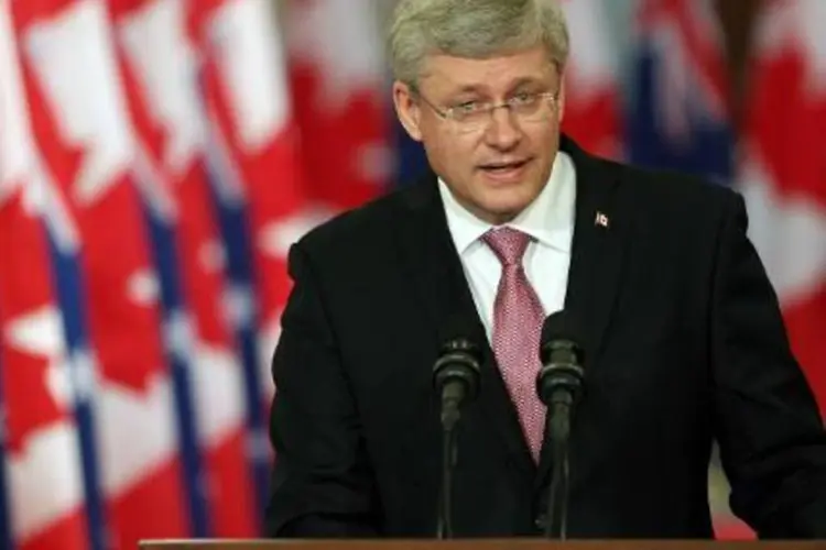 
	O primeiro-ministro do Canad&aacute;, Stephen Harper :Harper passou cerca de 15 minutos dentro de um arm&aacute;rio
 (Cole Burston/AFP)