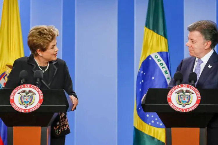 
	Presidente Dilma Rousseff e o presidente da Col&ocirc;mbia, Juan Manuel Santos: os acordos permitir&atilde;o reduzir, ao menos em parte, o impacto da desacelera&ccedil;&atilde;o de suas economias devido &agrave; queda dos pre&ccedil;os das commodities
 (Roberto Stuckert Filho/PR)