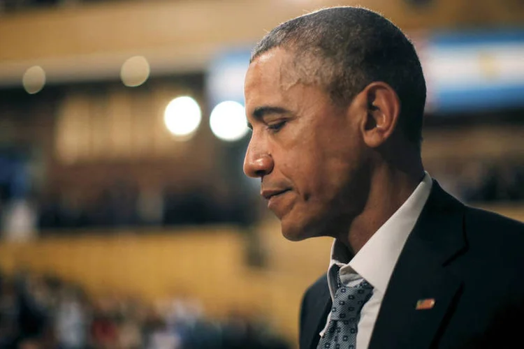
	Barack Obama na Argentina: &quot;Obama n&atilde;o ir&aacute; dizer &#39;perdoem-nos&#39; com todas as letras, mas est&aacute; dizendo-o por suas a&ccedil;&otilde;es&quot;, opinou Daniel Slutzky, um professor universit&aacute;rio
 (Carlos Barria/ Reuters)