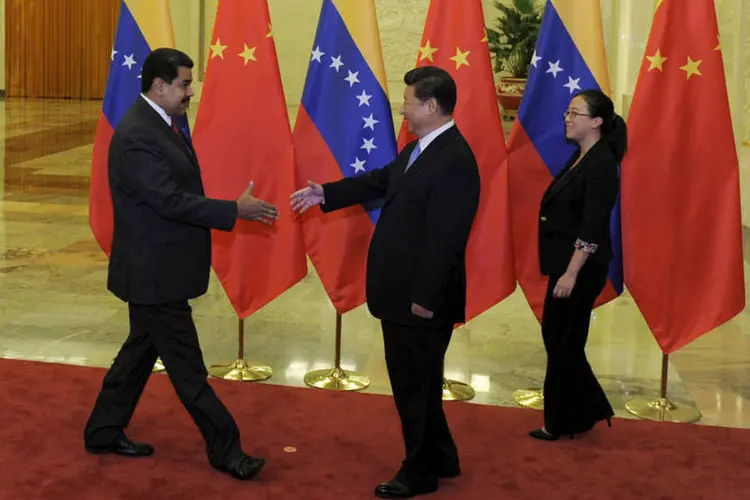 Acordo: presidente chinês, Xi Jinping, recebe o presidente da Venezuela, Nicolás Maduro, em Pequim, na China (REUTERS/Parker Song/Pool)
