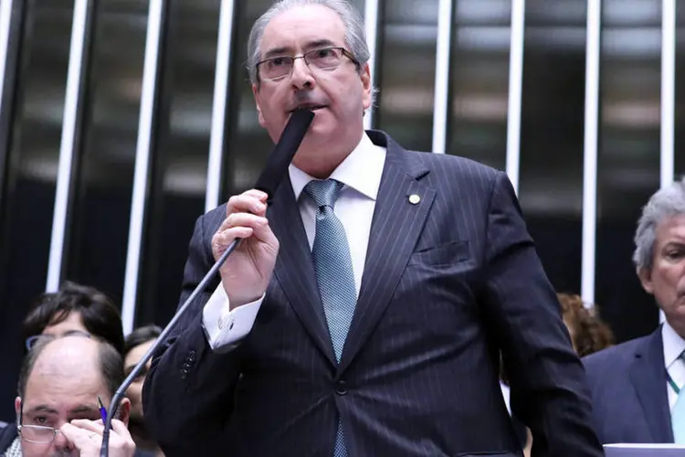 
	Eduardo Cunha votando a favor do impeachment: aliados garantem que j&aacute; t&ecirc;m maioria na comiss&atilde;o de &eacute;tica para blind&aacute;-lo contra as acusa&ccedil;&otilde;es.
 (Antonio Augusto / Câmara dos Deputados)
