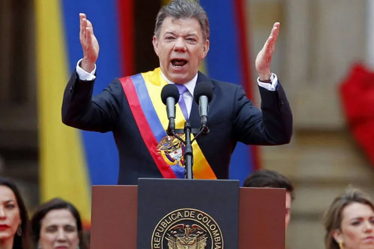 
	Juan Manuel Santos: &quot;O pr&oacute;ximo ano deveria ser o ano da paz porque, se n&atilde;o for, parece-me que a partir da&iacute; seria dif&iacute;cil continuar esse processo indefinidamente&quot;, disse o presidente colombiano
 (Jose Miguel Gomez/Reuters)