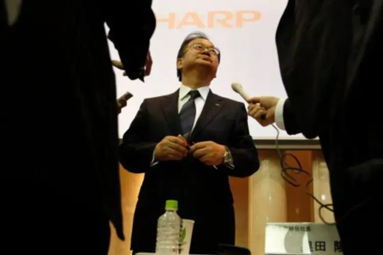 
	Presidente da Sharp, Takashi Okuda: executivo disse que a fabricante negocia com a taiwanesa Hon Hai sobre um investimento de capital
 (Issei Kato/Reuters)