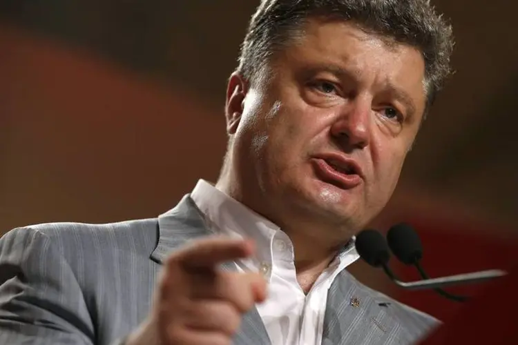 
	Petro Poroshenko: Poroshenko decidiu cancelar sua visita &agrave; Turquia
 (David Mdzinarishvili/Reuters)