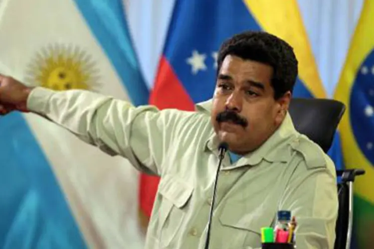 
	Nicol&aacute;s Maduro: presidente expulsou &nbsp;tr&ecirc;s diplomatas americanos acusados de se reunir com os l&iacute;deres das manifesta&ccedil;&otilde;es de Caracas
 (Presidencia/AFP)