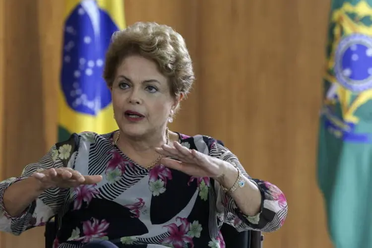 
	A presidente Dilma Rousseff: &quot;a Petrobras vira uma p&aacute;gina, acerta o seu passo e eu tenho certeza que a Petrobras vai dar ainda muitas alegrias&quot;
 (Lula Marques/Bloomberg)