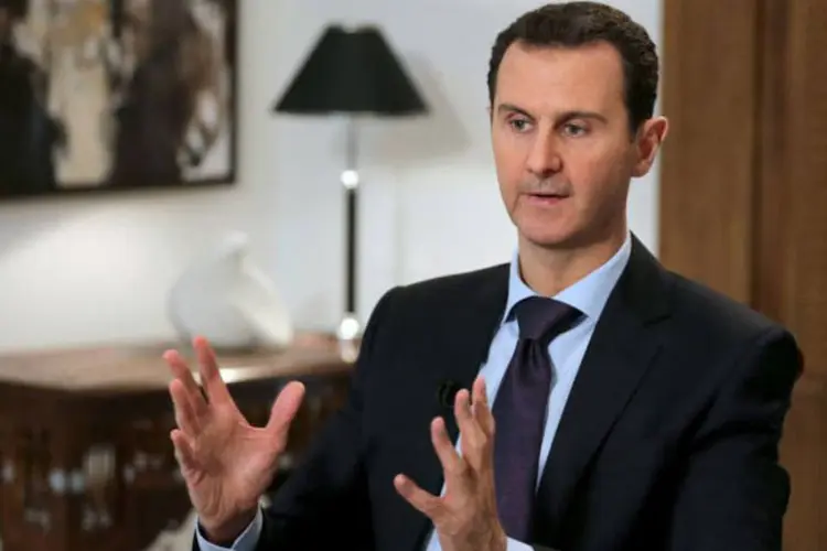 
	Bashar al-Assad: &quot;h&aacute; vontade popular para que sejam realizadas elei&ccedil;&otilde;es presidenciais antecipadas? Se a resposta for sim, n&atilde;o tenho problema algum com isto&quot;, disse Assad
 (Joseph Eid / AFP)