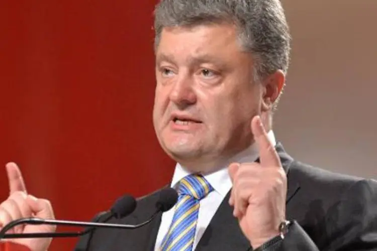
	Petro Poroshenko:&nbsp;&quot;plano de paz come&ccedil;a com minha ordem de cessar-fogo unilateral&quot;
 (Sergei Supinsky/AFP)