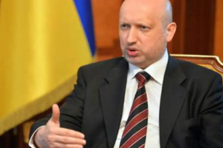 O presidente ucraniano interino Olexander Turchynov: "forças de segurança nunca usarão armas contra manifestantes pacíficos" (Sergei Supinsky/AFP)