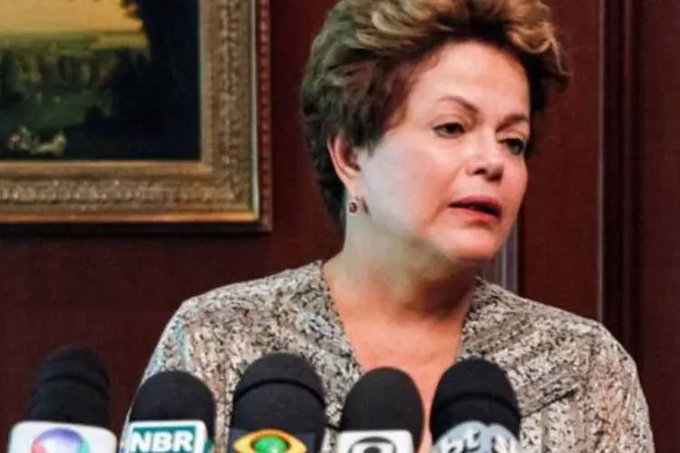 Dilma Rousseff em coletiva de imprensa em Santiago do Chile sobre o incêndio em Santa Maria, no Rio Grande do Sul (AFP/Roberto Stuckert Filho)