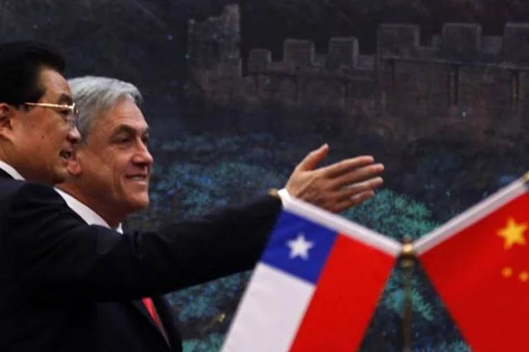 Os presidentes da China, Hu Jintao, e do Chile, Sebastian Pinera, negociam acordo  (Getty Images)