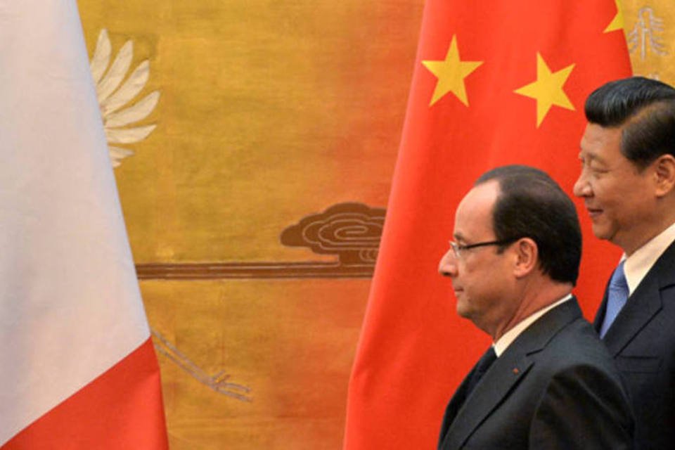 Os presidentes Francois Hollande (França) e Xi Jinping (China): na Europa os investimentos chineses não causam tanta polêmica como nos EUA (REUTERS)