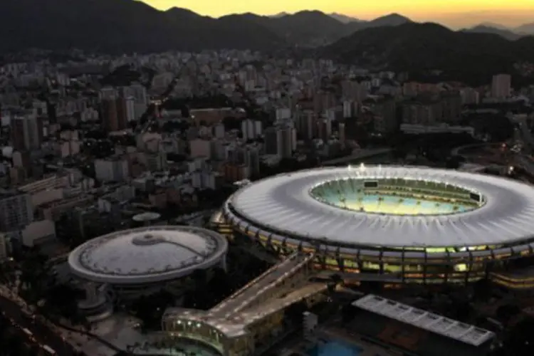 
	O novo Maracan&atilde; inserido na paisagem do Rio de Janeiro: de 2007 a 2012 a capital fluminense registrou um salto de 225% nos investimentos
 (Divulgação/ Consórcio Maracanã 2014)