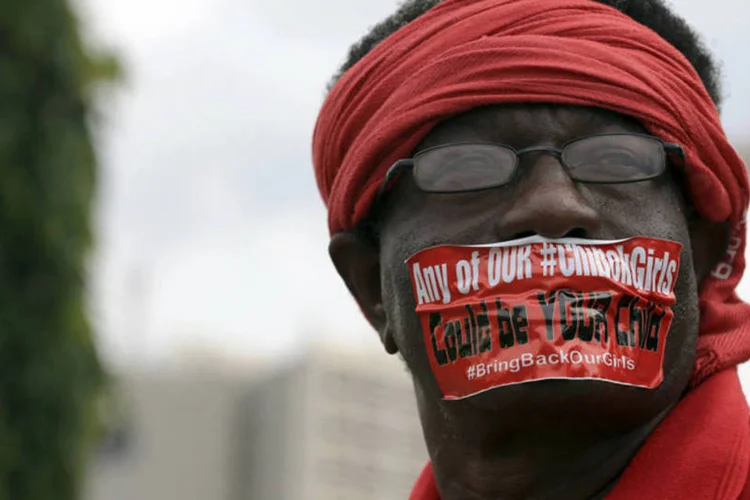
	Protesto contra o Boko Haram: os jihadistas invadiram no dia 14 de abril de 2014 a escola de Chibok, no estado de Borno, e conseguiram sequestrar 276 meninas que se preparavam para fazer suas provas
 (Afolabi Sotunde/Reuters)