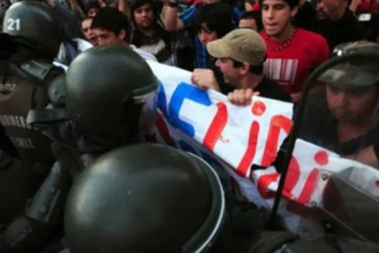 Passeata contra Obama no Chile: em outro protesto, 7 pessoas foram detidas (Claudio Santana/AFP)