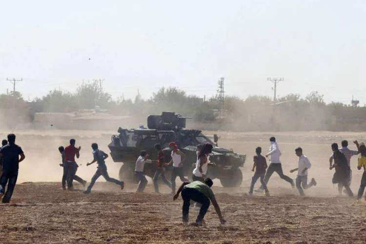 Curdos batalham na Turquia: protestos ocorreram em ao menos 6 cidades do país nesta terça (Umit Bektas/Reuters)