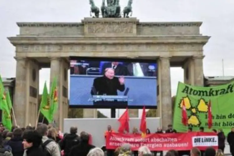 Ativistas protestam contra a decisão dos deputados (John Macdougall/AFP)