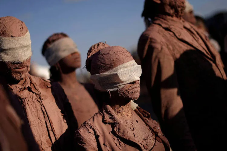 
	Protesto: a primeira parte da performance urbana, totalmente silenciosa, foi realizada em frente ao Pal&aacute;cio do Planalto
 (Ueslei Marcelino / Reuters)