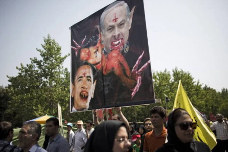 Cartaz em protesto de apoio aos palestinos no Irã (AFP/Getty Images)