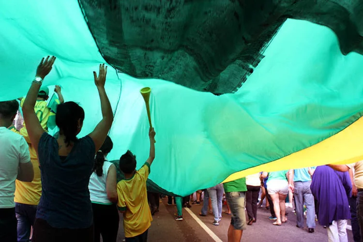 
	Protesto na Avenida Paulista. &quot;N&atilde;o vejo nenhum impacto mais forte para qualquer tipo de ativo&quot;, avalia o analista-chefe da CM Capital Markets, Marco Aur&eacute;lio Barbosa
 (Valéria Bretas/EXAME.com)