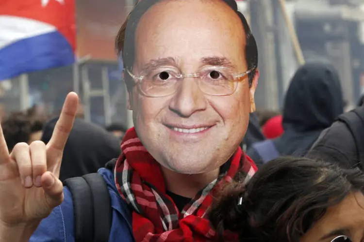 
	Protestos na Fran&ccedil;a: &quot;Permanecerei firme porque acredito que &eacute; uma boa reforma e devemos continuar at&eacute; sua ado&ccedil;&atilde;o&quot;, disse Hollande
 (Jean-Paul Pelissier / Reuters)