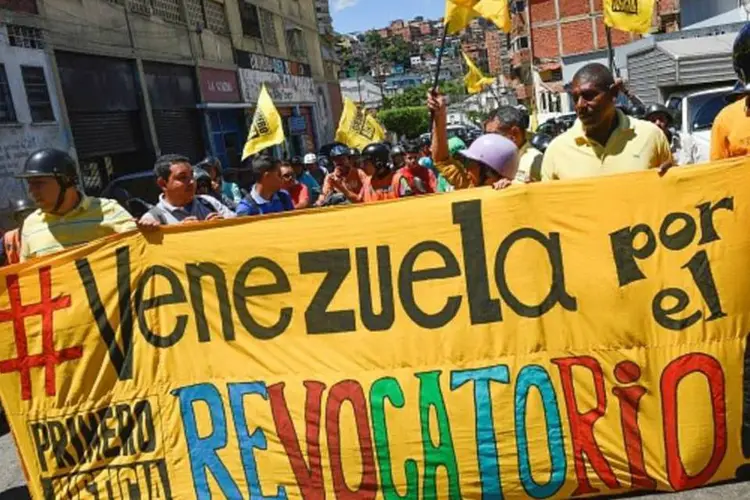 
	Venezuela: ao ler um comunicado ante a multid&atilde;o, Torrealba tamb&eacute;m anunciou que, em 14 de setembro, ser&aacute; realizada uma mobiliza&ccedil;&atilde;o de 12 horas em todas as capitais do pa&iacute;s
 (Getty Images)