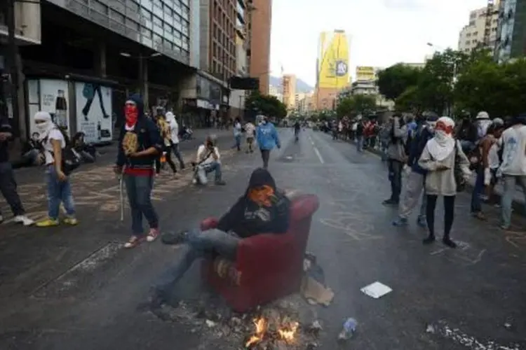 Protesto contra o governo da Venezuela na capital Caracas: a Venezuela é sacudida há quase três meses por uma onda de protestos (Juan Barreto/AFP)