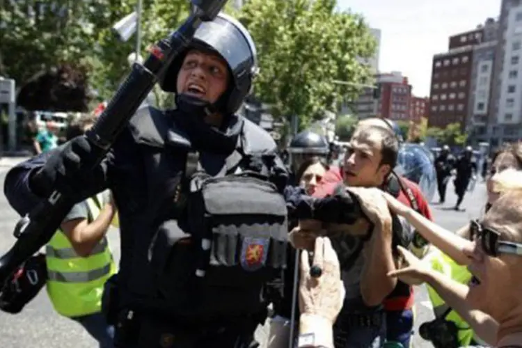 Protestos em Madri: os confrontos deixaram 23 pessoas levemente feridas (©AFP / cesar manso)