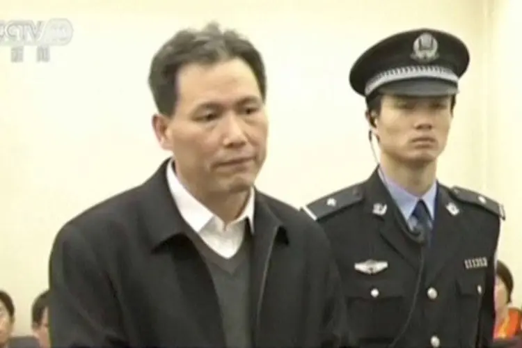 Advogado de defesa dos direitos humanos Pu Zhiqiang em tribunal em Pequim (REUTERS/CCTV)