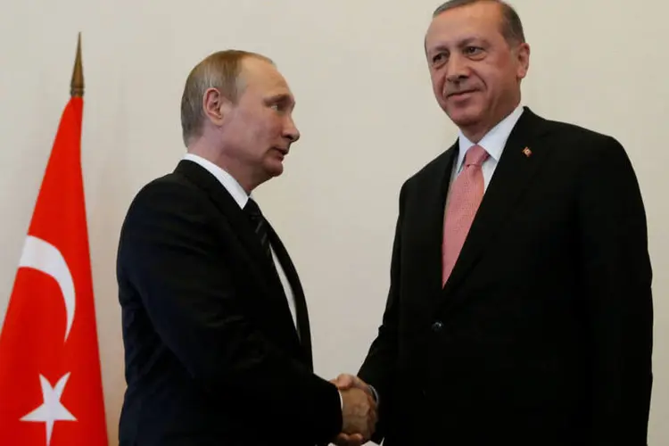 
	Putin e Erdogan: &quot;Acredito que com os passos que daremos hoje come&ccedil;aremos um processo mais amplo (de coopera&ccedil;&atilde;o)&quot;
 (REUTERS/Sergei Karpukhin)