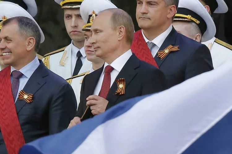 
	Presidente da R&uacute;ssia, Vladimir Putin: Minist&eacute;rio de Rela&ccedil;&otilde;es Exteriores russo acusou os EUA de &quot;padr&atilde;o duplo&quot; por n&atilde;o se pronunciarem sobre os abusos de autoridades ucraniana
 (Maxim Shemetov/Reuters)