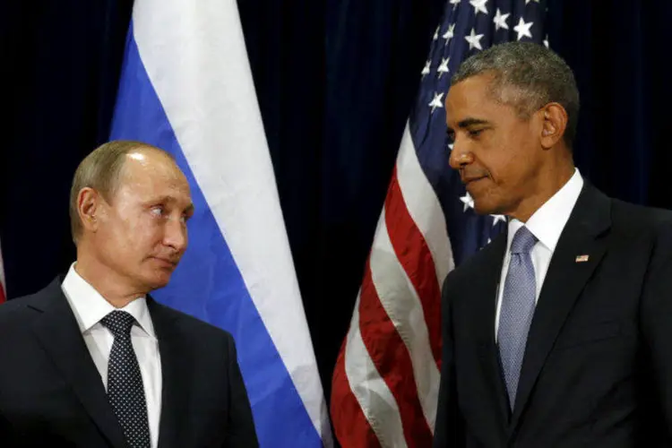 
	O presidente russo, Vladimir Putin (E), e o presidente americano, Barack Obama
 (Kevin Lamarque/Reuters)