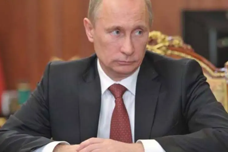 
	Vladimir Putin: presidente da R&uacute;ssia quer mais investimento estrangeiro para refor&ccedil;ar a economia do pa&iacute;s.
 (AFP/ Alexei Nikolsky)