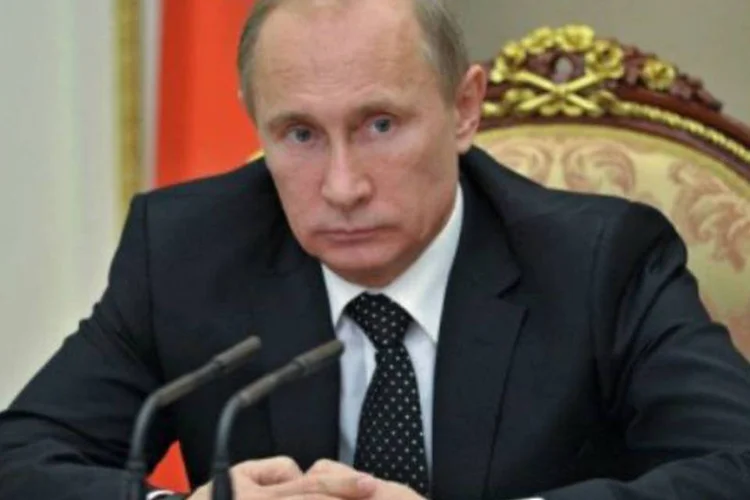 
	Vladimir Putin: em pleno surto patri&oacute;tico, as autoridades fizeram quest&atilde;o de comemorar o evento.
 (©AFP / Alexei Nikolsky)
