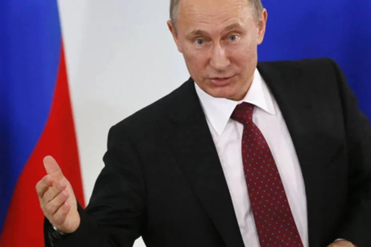 O presidente russo, Vladimir Putin: "Os Estados Unidos intimidaram todos os países que poderiam tê-lo recebido pelo fato de que o encurralaram em nosso território", afirmou. (REUTERS/Yuri Kochetkov/Pool)