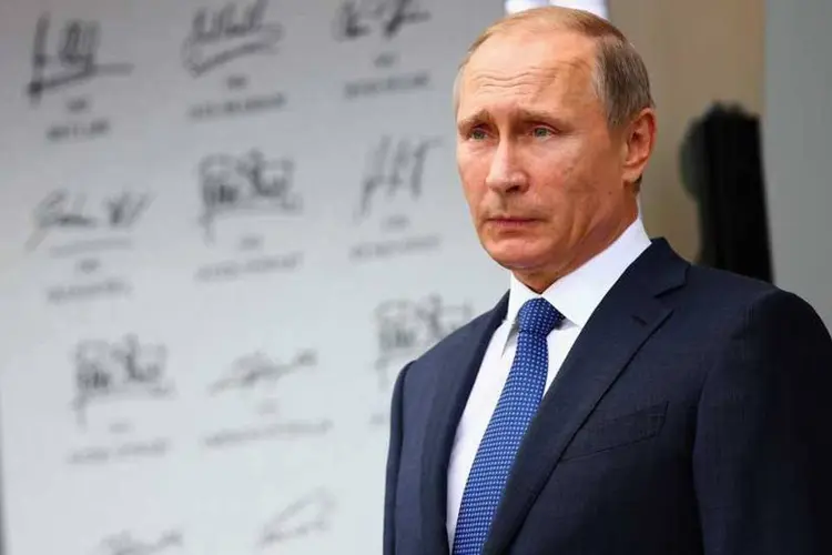 
	Vladimir Putin: o presidente classificou a puni&ccedil;&atilde;o de &quot;injusta&quot;, j&aacute; que impedia que mesmo atletas inocentes possam participar
 (Clive Mason/Getty Images)