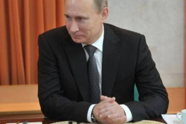 Putin é o vencedor das eleições presidenciais de domingo com a apuração de 99,07% dos votos, após receber quase 64% deles (Alexei Nikolsky/AFP)